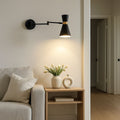 Swing arm wall sconce
