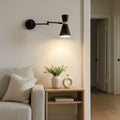 Swing arm wall sconce