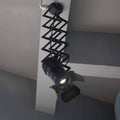 Extending and adjustable ceiling lamp