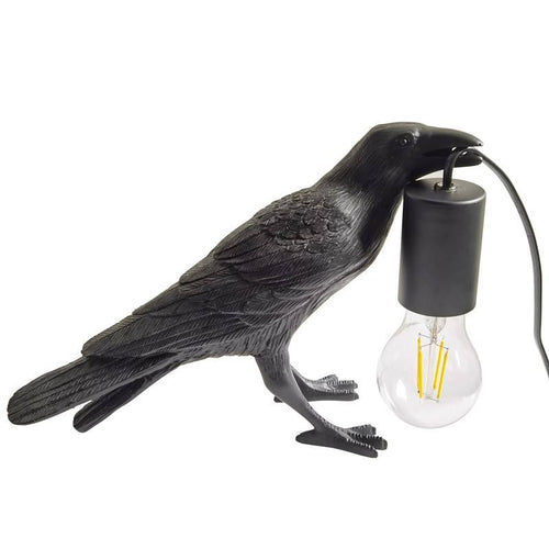 Raven table lamp in resin