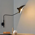 Designerska lampa ścienna