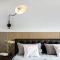 Designerska lampa ścienna
