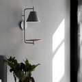 Wall light with shelf