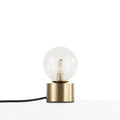 Table lamp with glass sphere