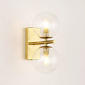 Wall sconce with double glass sphere