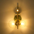 Wall light with glass spheres
