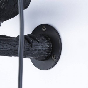 Raven resin wall sconce "Corb" | Bird series