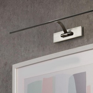 Chromed wall light for picture lighting
