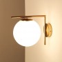 Gold wall sconce