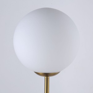 Detail of E27 floor lamp in golden chrome and opaline glass
