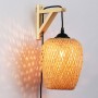 Wall light with wooden bracket and wicker shade "Alan".