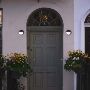 Illuminated facade with sensor