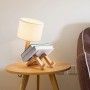 Articulated wooden table lamp