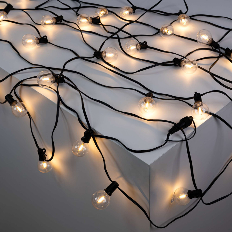 Ghirlanda luminosa per esterni 15 + 2 metri - 30 lampadine a filamento LED E27 G40 1W - IP44 - Bianco caldo Ghirlanda luminosa per esterni 15 + 2 metri - 30 lampadine a filamento LED E27 G40 1W - IP44 - Bianco caldo