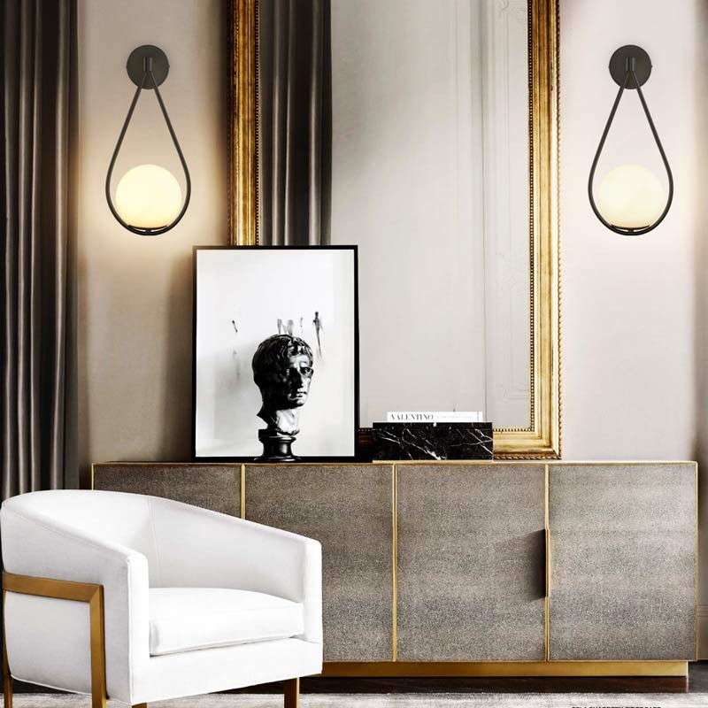 Clara" gouden glazen bol wandlamp