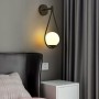Clara" gouden glazen bol wandlamp